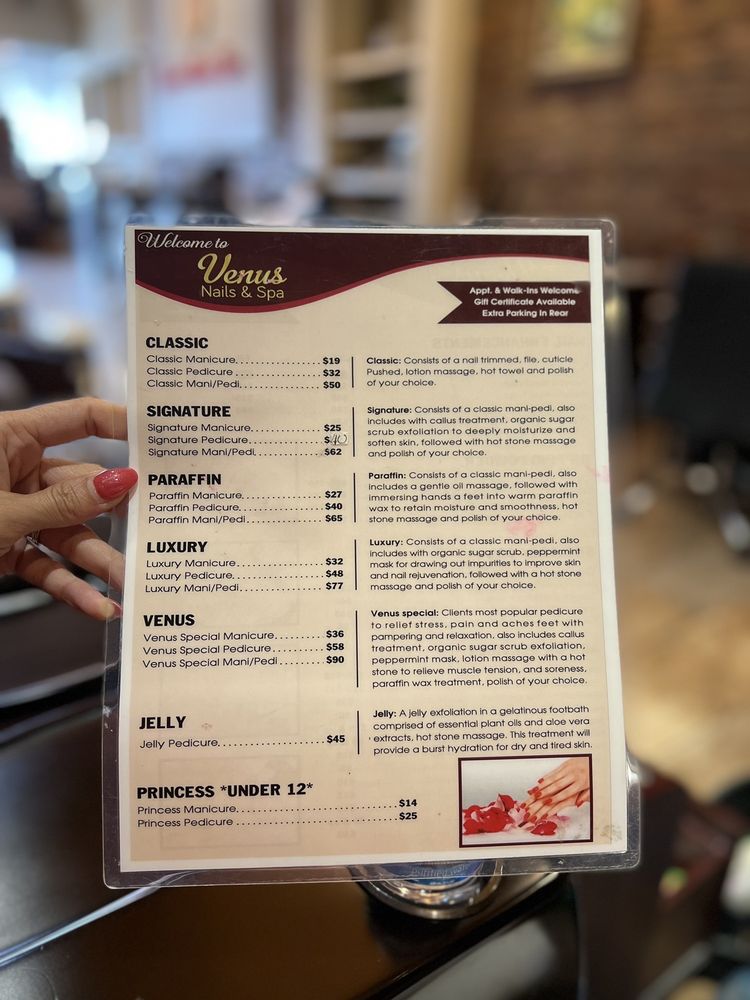 Printed Venus Nails and Spa menu showing manicure and pedicure service categories