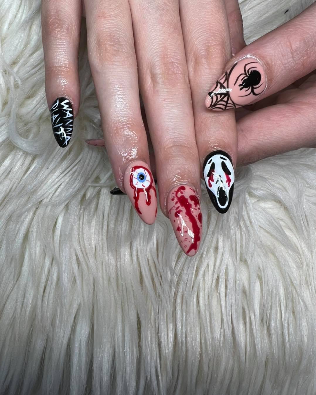 Seasonal detailed nail-art set on a textured salon blanket